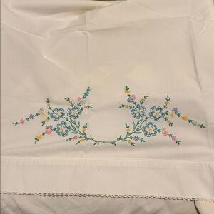 Two Embroidered White Pillowcases